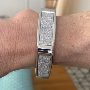 Source Unknown Silver and rhinestone spring bangle